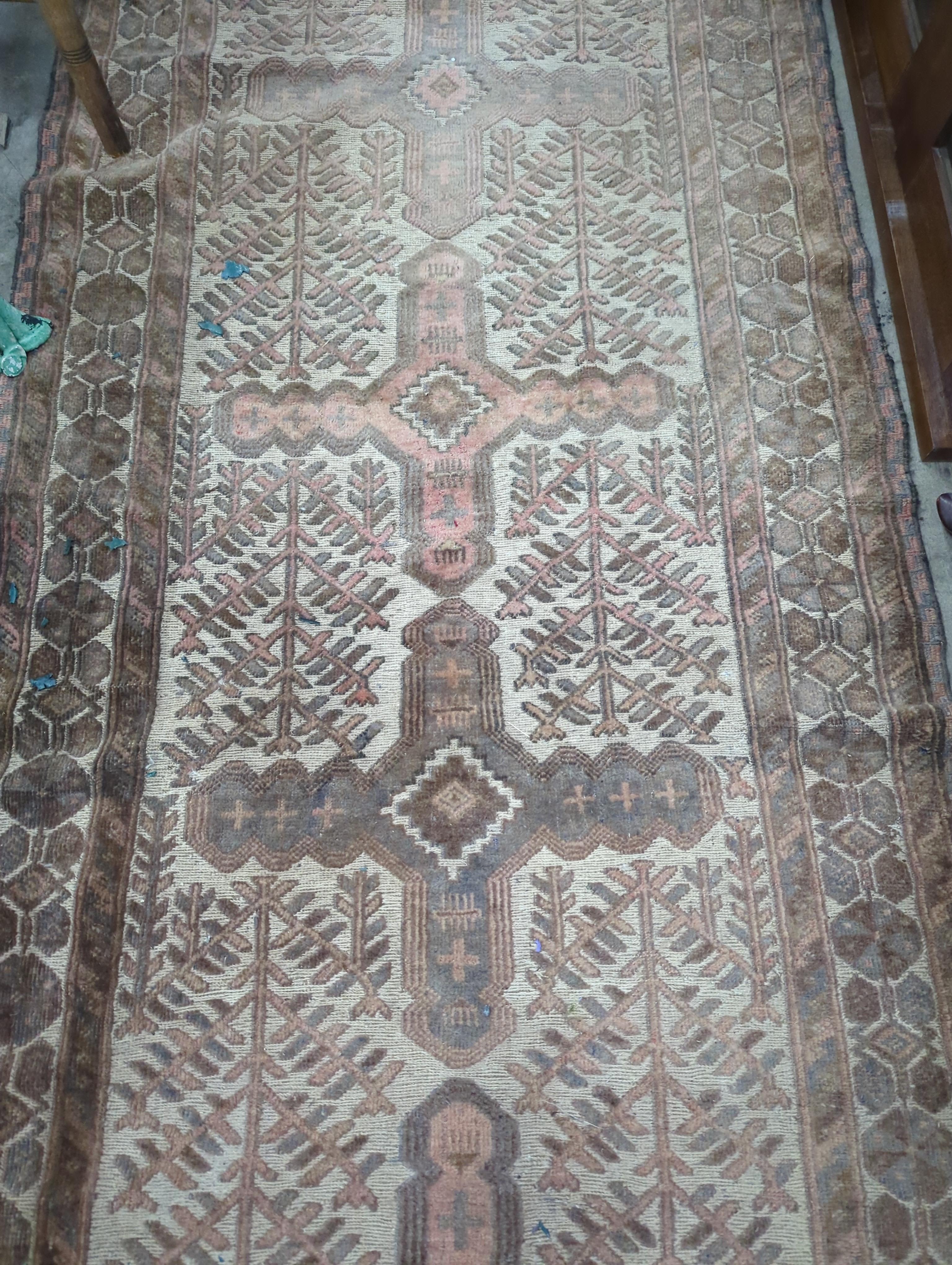 An ivory ground Afghan runner, 370 x 93cm